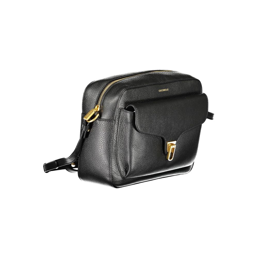 Coccinelle Black Leather Women Handbag with gold accents, featuring adjustable strap and secure zip, perfect for elegant daily use.