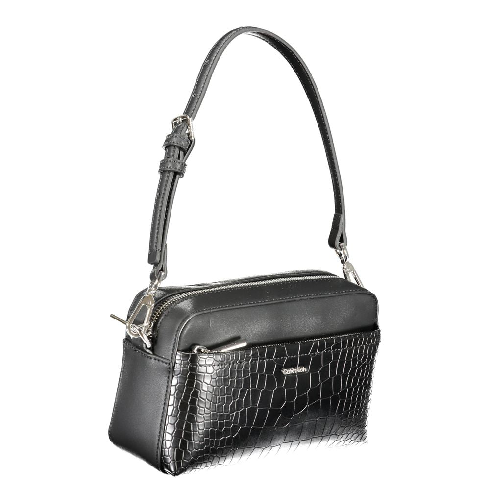 Calvin Klein Black Polyester Handbag with adjustable shoulder strap, external pocket, and zip closure.