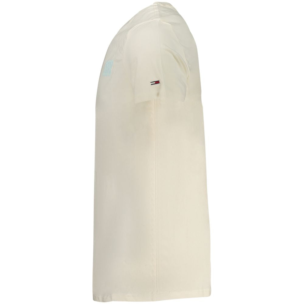 Side view of Tommy Hilfiger Beige Cotton Men T-Shirt with short sleeves, showcasing its sleek design and iconic logo on sustainable cotton.