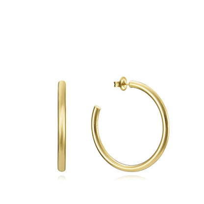 Gold hoop earrings, side and front view on white background. Simple, sleek design, perfect for any occasion or outfit.