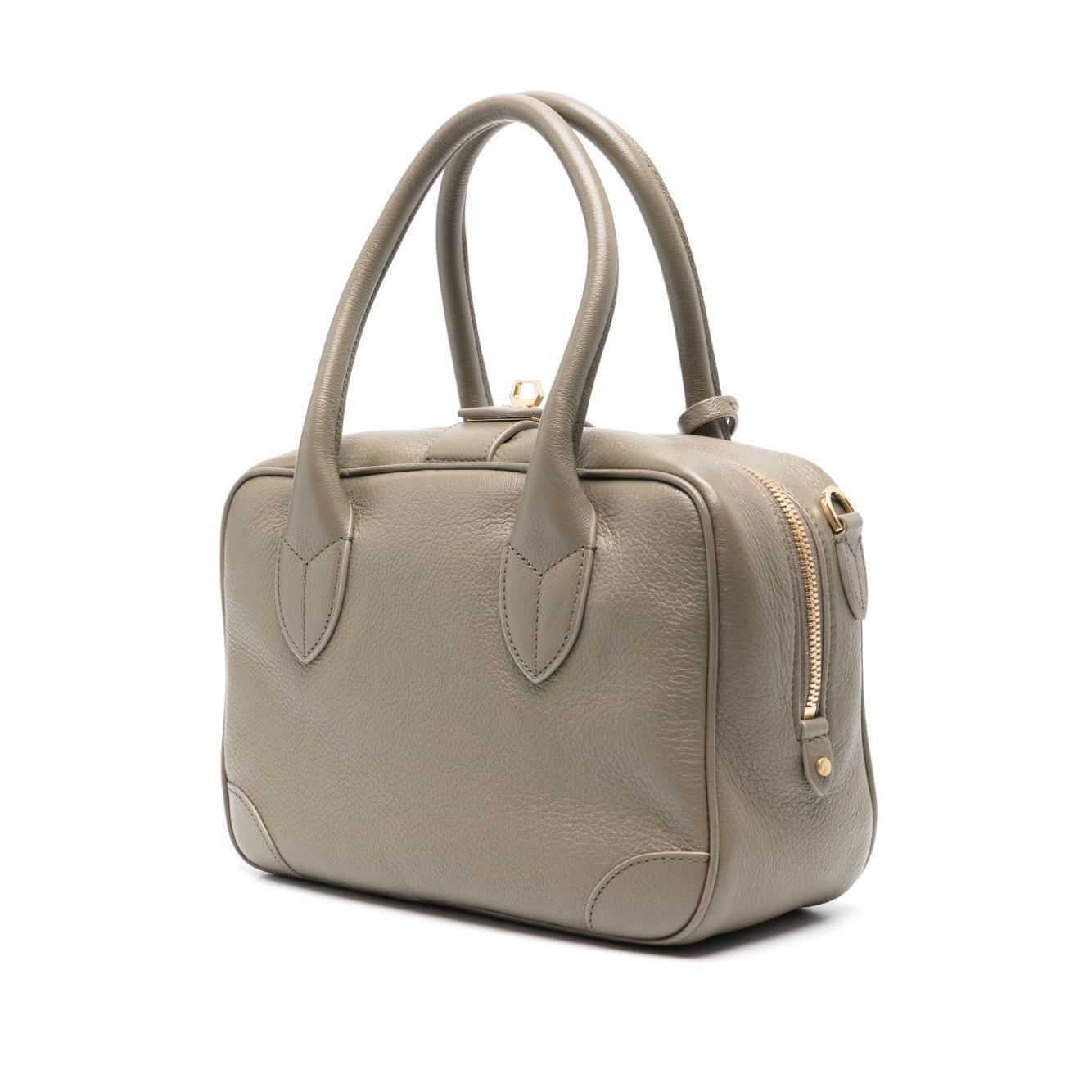 Front view with bag zipped and handles upright.