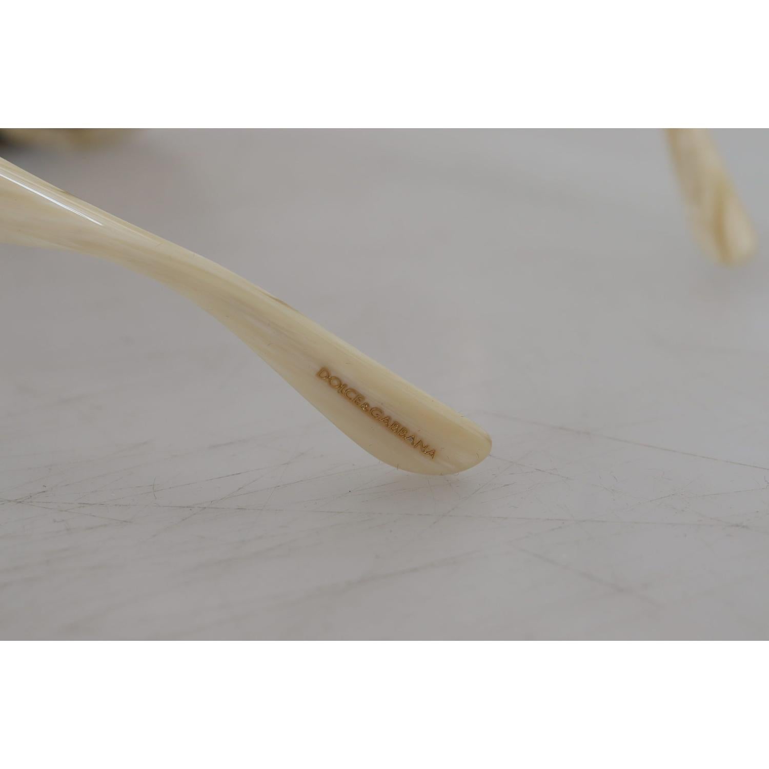 نظارة شمسية دولتشي آند غابانا أسيتات أنيقة باللون البيج للنساء