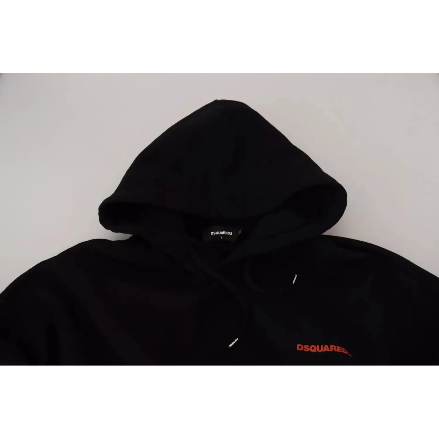 سترة Dsquared² المصنوعة من القطن باللونين الأسود والأحمر مع غطاء رأس وصبغة التعادل