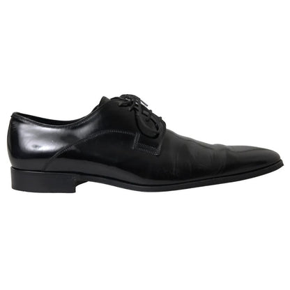 Dolce & Gabbana Black Polished Leather Formal Dress Shoes with minor wear signs, 100% leather, made in Italy, elegant design.