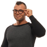 Man wearing Ermenegildo Zegna Black Men Glasses Frame with horn material and full-rim style, showing round lenses and black temples.