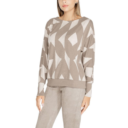 Woman wearing Street One Brown Polyester Sweatshirt with geometric print and crew neckline, perfect for modern style and comfort.
