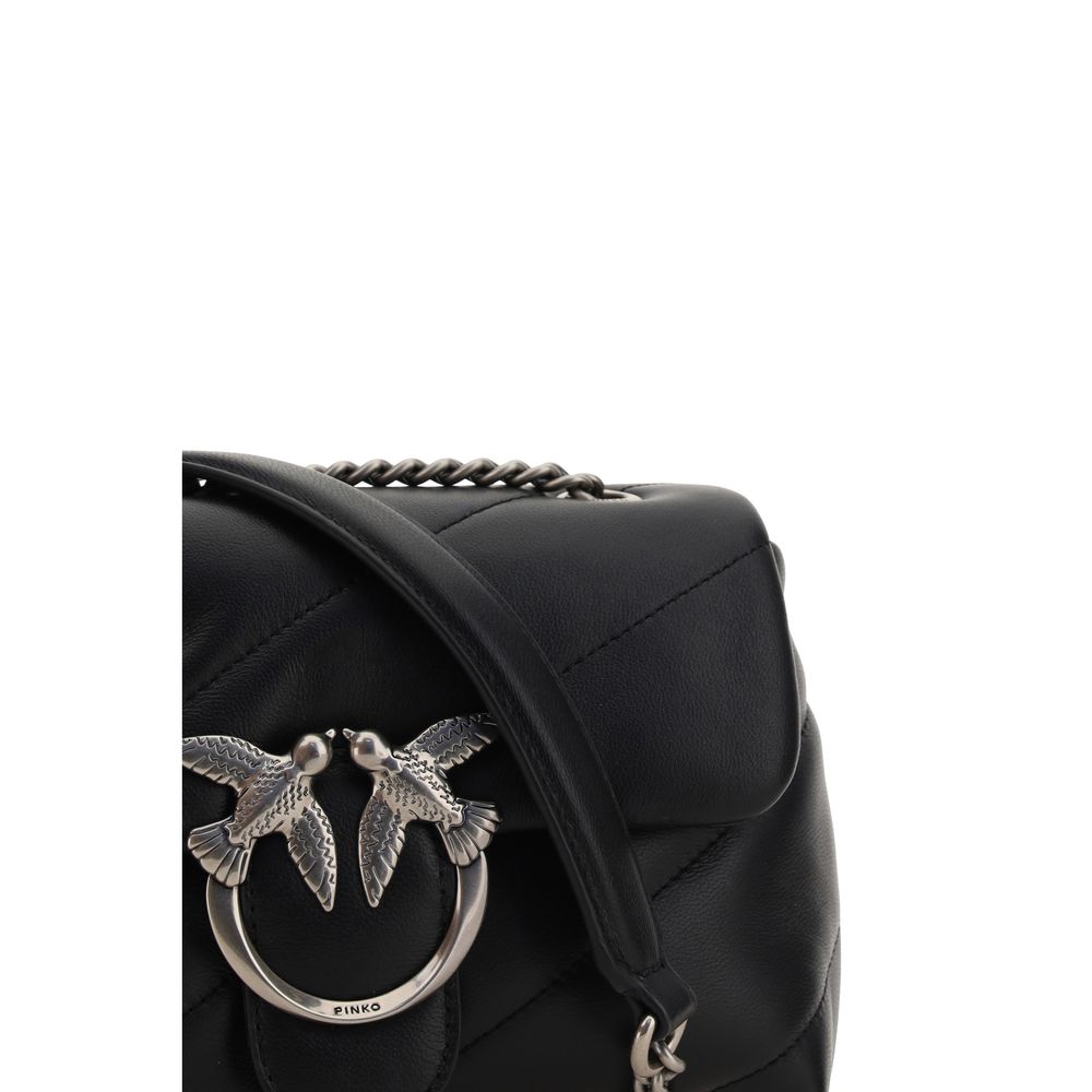 Front view with bag zipped and handles upright.
