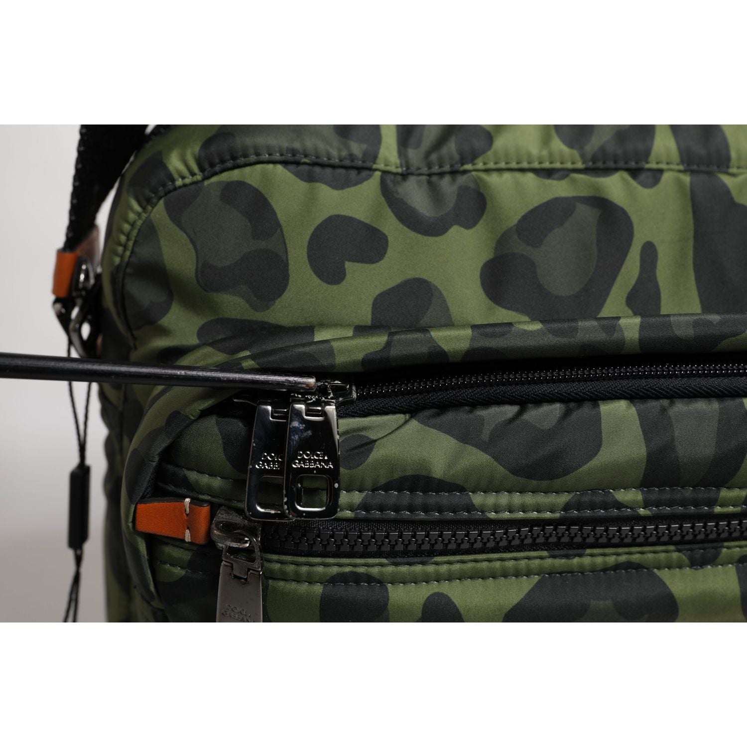 Front view with bag zipped and handles upright.