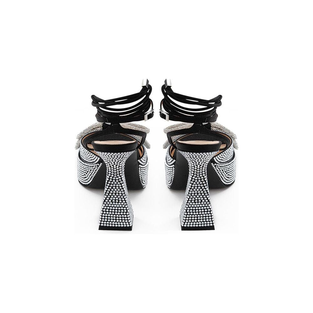 أحذية MACH &amp; MACH الأنيقة المصنوعة من الجلد الأسود لإطلالة راقية