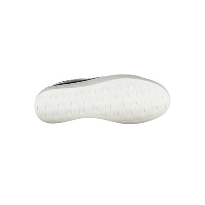 Sole view of Calvin Klein Black Polyester Women Sneaker showcasing white textured bottom design.