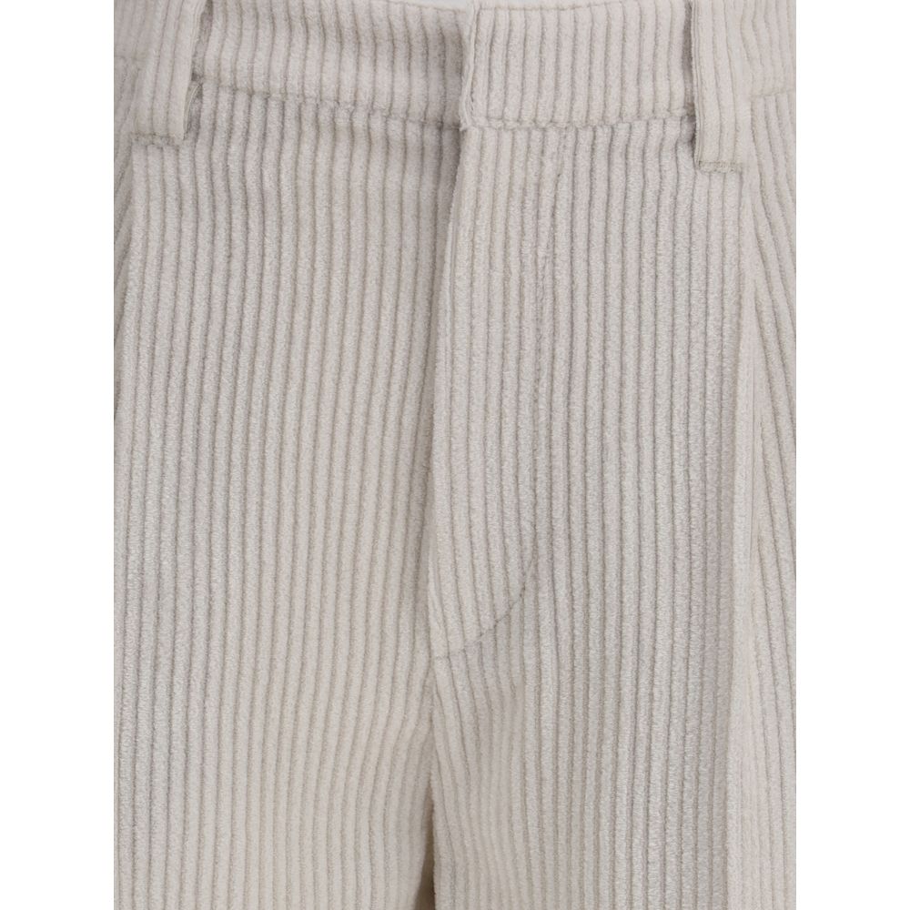 Brunello Cucinelli White Viscose Casual Pants with corduroy texture and tailored design, featuring zip-and-button closure and wide leg.