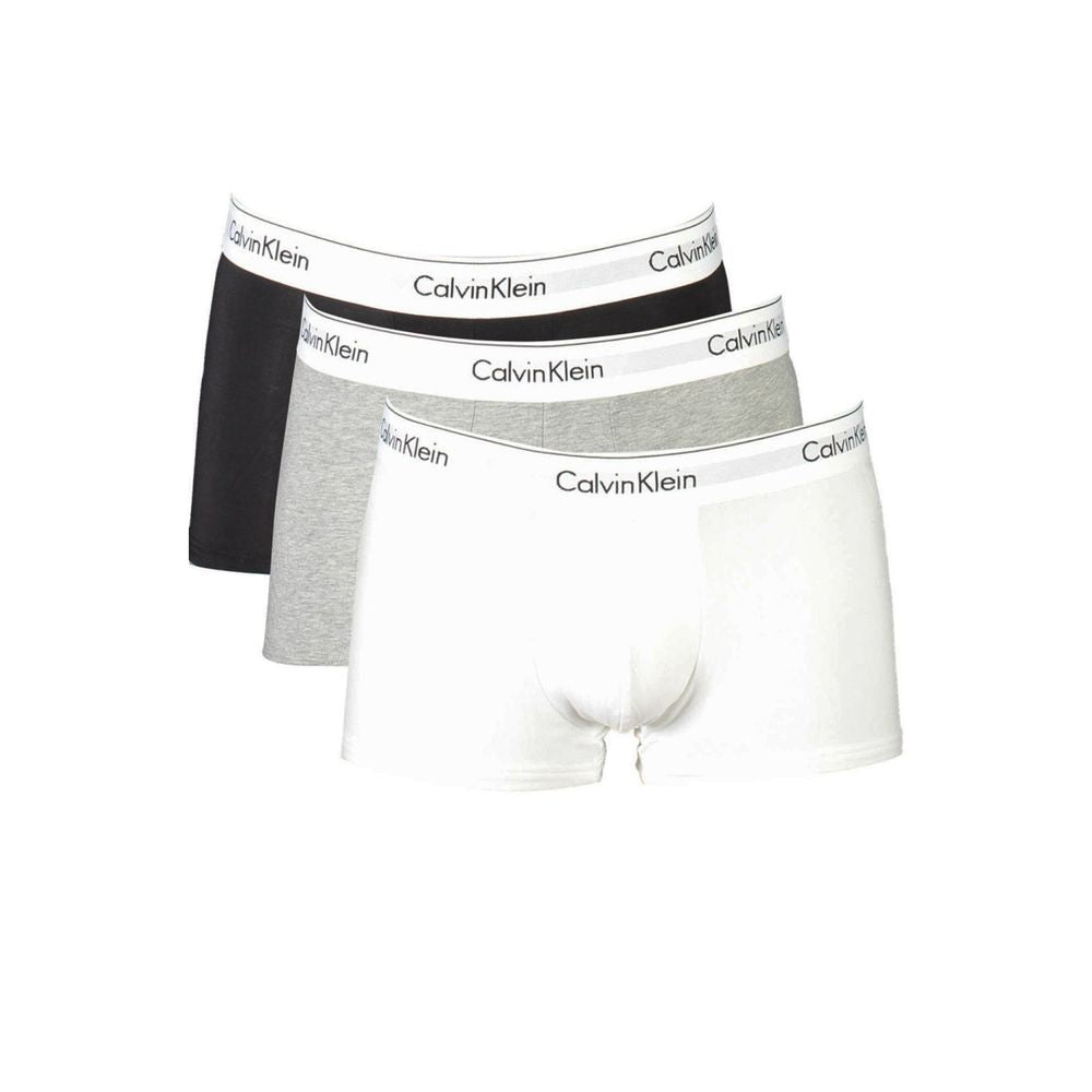Calvin Klein Brown Cotton Men Boxer tri-pack featuring low-waist design, elastic waistband, and premium regenerative cotton blend.