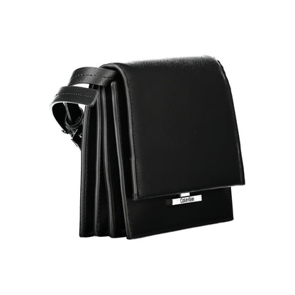 Calvin Klein Black Polyethylene Handbag with adjustable shoulder strap, internal compartments, pocket, and logo on snap closure.