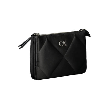 Calvin Klein Black Polyester Handbag with adjustable shoulder strap, two compartments, internal card pocket, and zip closure.