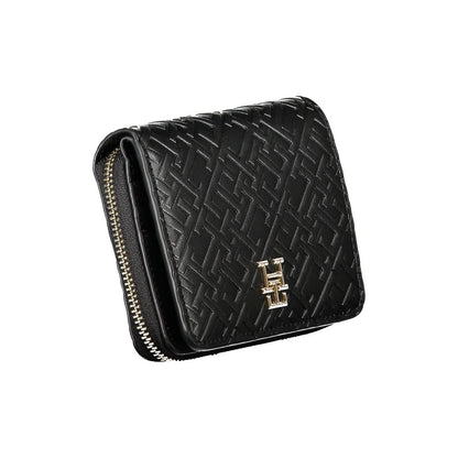 Tommy Hilfiger Black Polyethylene Wallet with logo, featuring coin purse, double card spaces, contrasting details, zip and automatic closure.