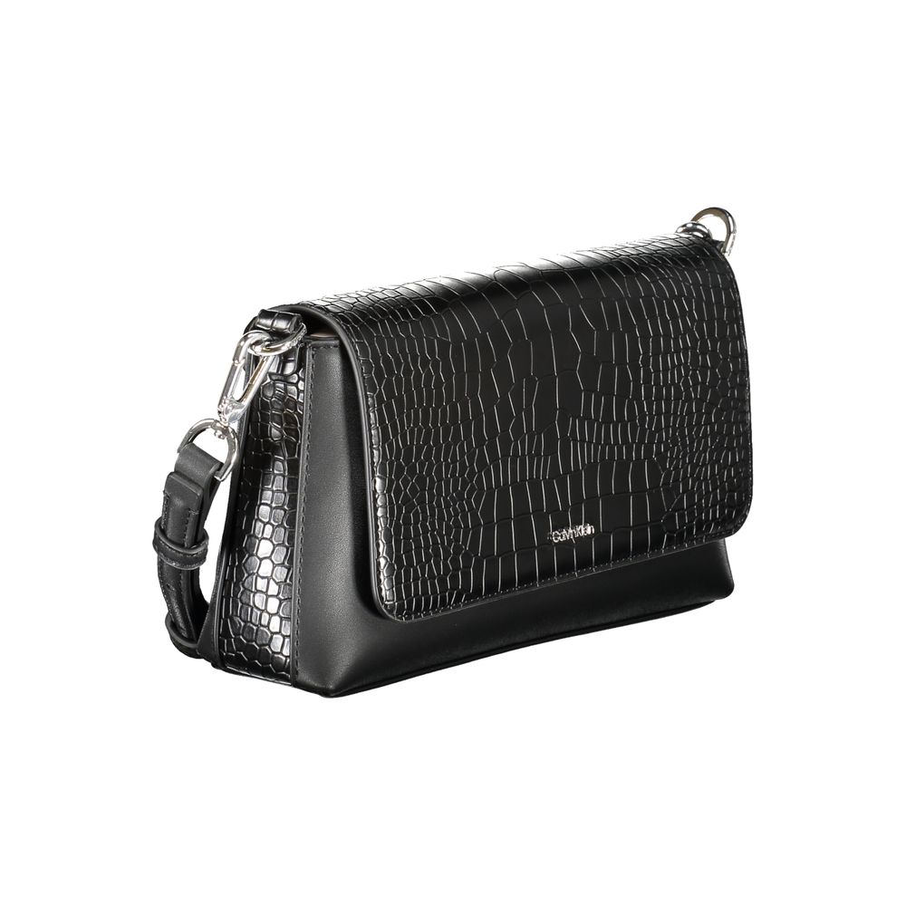 Calvin Klein Black Polyester Handbag with adjustable strap, card pocket, and automatic closure in contrast detailing.