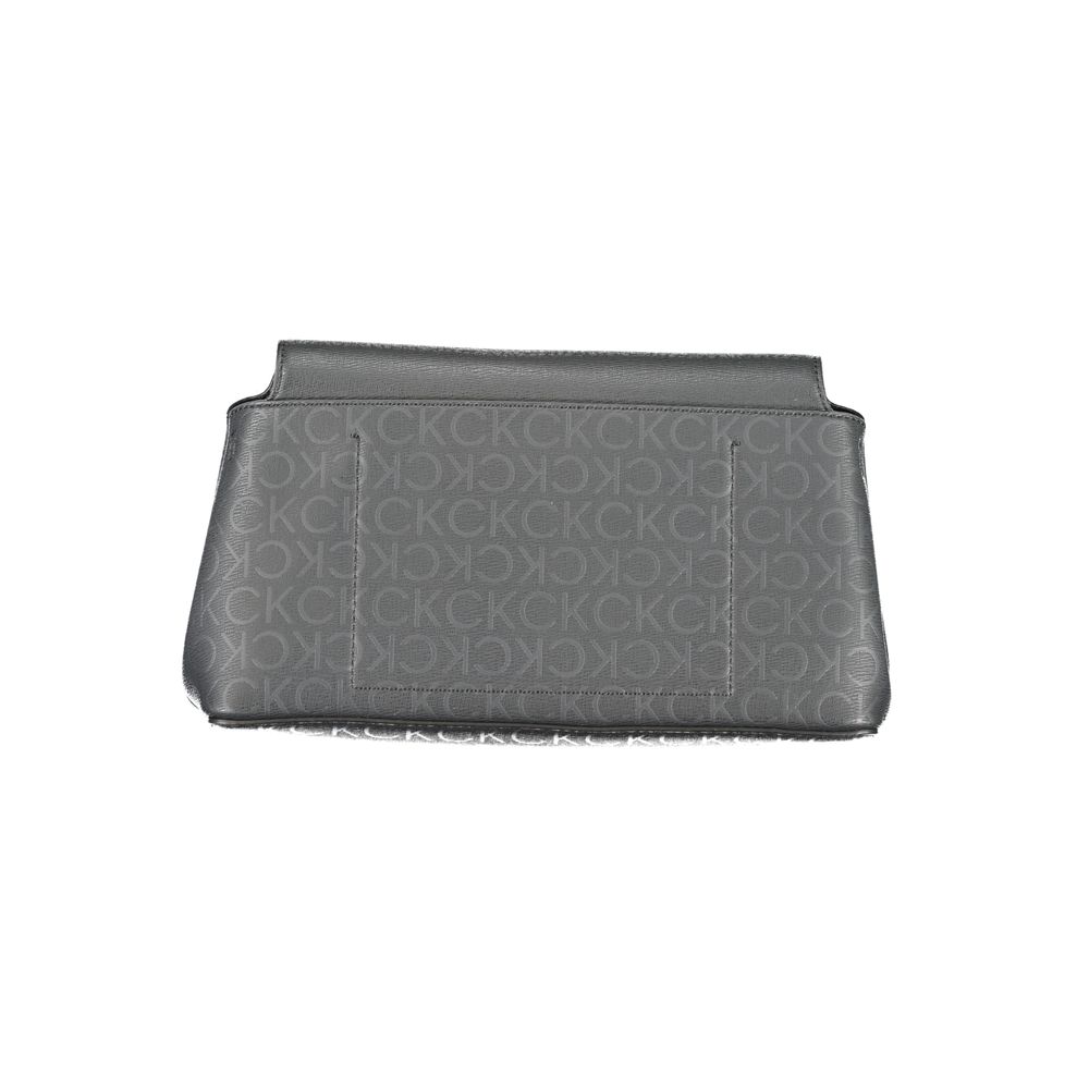 Calvin Klein Black Polyester Handbag with logo pattern, adjustable strap, snap closure, made from 50% recycled polyester.