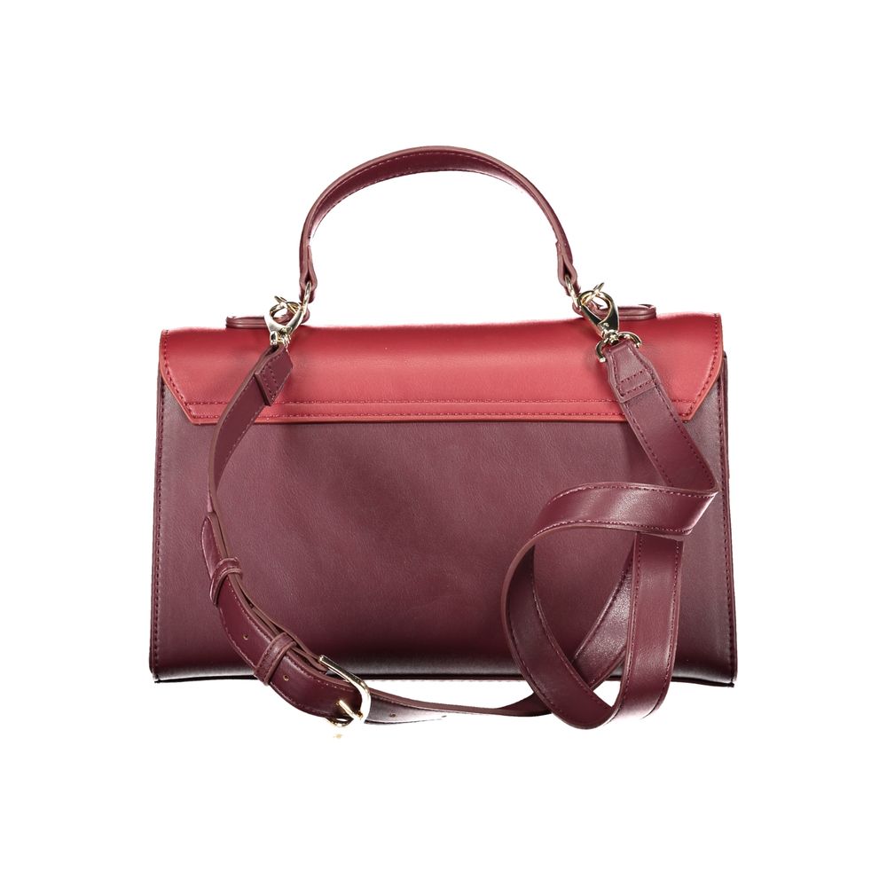 Front view with bag zipped and handles upright.