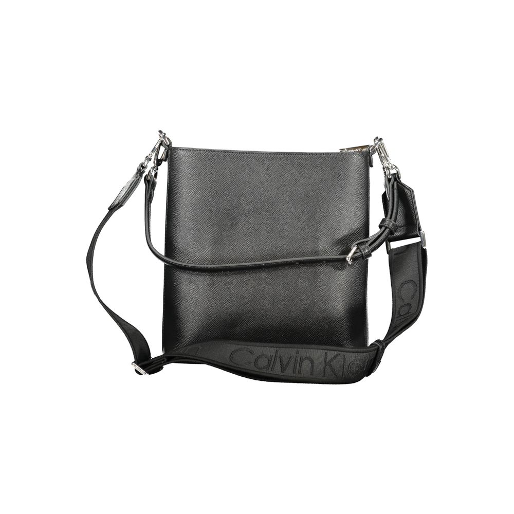 Calvin Klein Black Polyester Handbag with adjustable strap and internal pocket, featuring zip closure and logo.