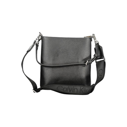 Calvin Klein Black Polyester Handbag with adjustable strap and internal pocket, featuring zip closure and logo.