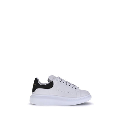 Alexander McQueen White Calf Leather Bos Taurus Platform Sneakers, side view showing elegant and bold contemporary design.