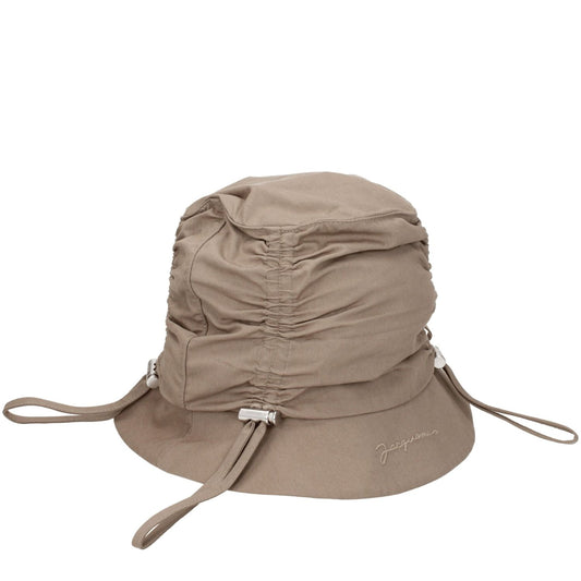 Jacquemus Beige Cotton Bucket Hat featuring front logo and drawstring detail, made of 75% cotton and 25% polyamide, casual style.