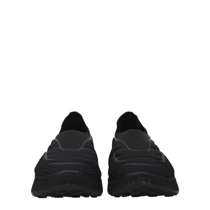 Front view of Givenchy Black Fabric Slip-On Loafers with a round toe and 6 cm mid heel, featuring a side logo. Casual style footwear.