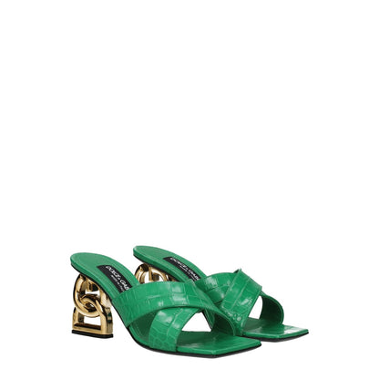 Dolce & Gabbana Green Leather Flat Sandals with gold mid heels and open toe design, featuring a stylish side logo and print details.