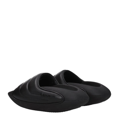 Balmain Black Leather Slippers with side logo, open toe design, 4 cm mid heels, rubber sole, and casual style.