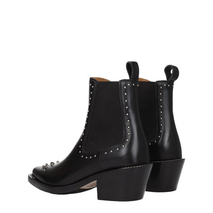 Chloé Black Leather Ankle Boots with studs and stones, featuring silver details and a rubber sole. Casual style with 6 cm mid heels and square toe.