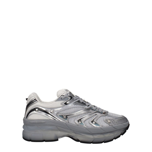Valentino Garavani Gray Fabric Athletic Sneakers with silver fabric, studs, and lace-up closure, featuring a rubber sole and round toe design.