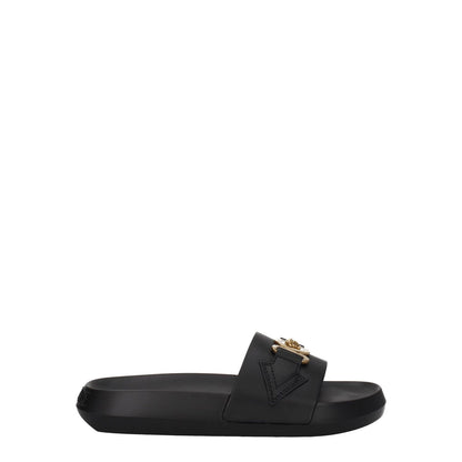 Versace Black Leather Slippers with gold front detail, open toe, and low flat heel. Casual style with rubber sole. MPN: 1011304DV46G1B00V