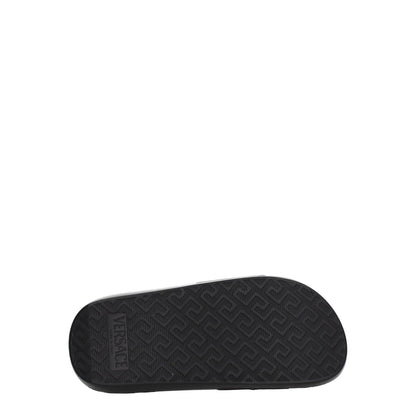 Sole of the Versace Black Leather Slippers with logo detail, made of rubber with a textured pattern for grip and durability.