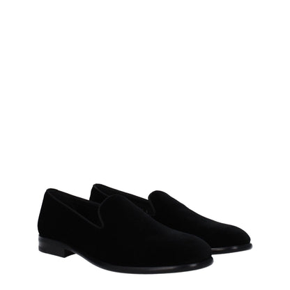 Dolce & Gabbana Black Velvet Slip-On Loafers with round toe, leather sole, and low flat heel, stylish footwear.