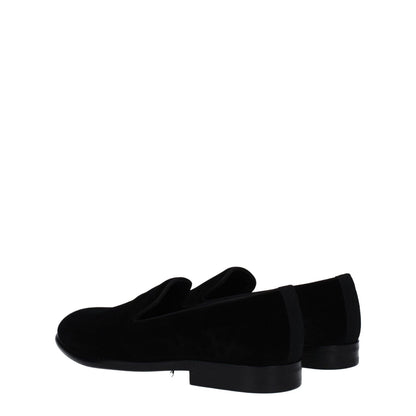 Dolce & Gabbana Black Velvet Slip-On Loafers with leather sole and round toe, side view showcasing stylish design.