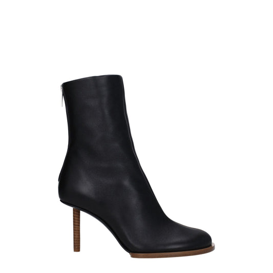 Jacquemus Black Leather Ankle Boots with square toe and high heel, featuring zip closure and leather sole.