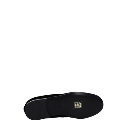 Underside view of Palm Angels Black Velvet Slip-On Loafers with logo and leather sole.