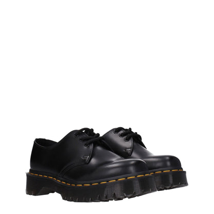 Dr. Martens Black Leather Oxfords And Derbies with lace-up design and round toe, featuring a 3.5 cm mid heel rubber sole.