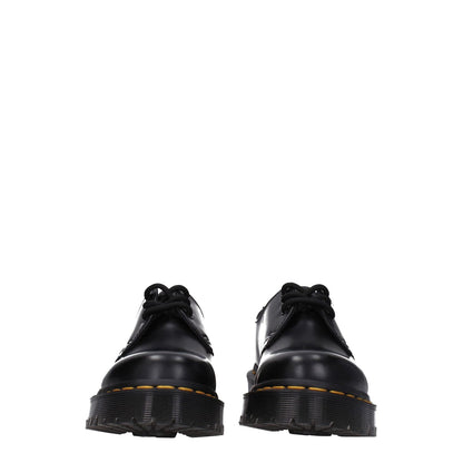 Dr. Martens Black Leather Oxfords And Derbies with lace-up design, round toe, rubber sole, and mid heels, MPN D1461BEX21084001.