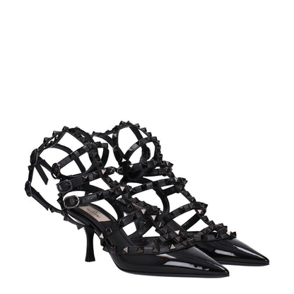 Valentino Garavani Black Leather Stiletto Heel Sandals with stud details, pointy toe, and buckle closure, made of patent leather.