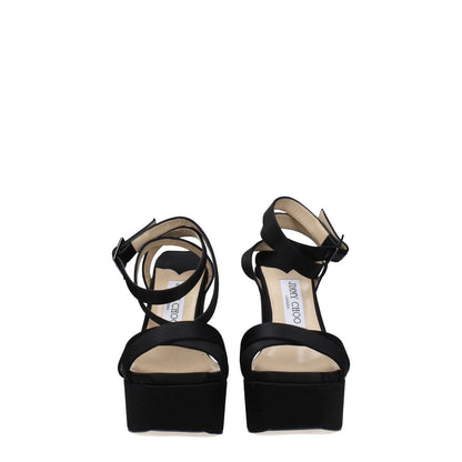 Jimmy Choo Black Satin Platform Sandals with buckle closure and high heels, open toe design, perfect for casual occasions.