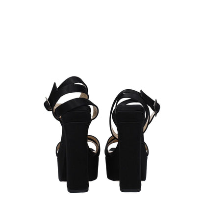 Jimmy Choo Black Satin Platform Sandals with buckle closure, open toe, high heel, leather sole, and rear view of the straps and heel.