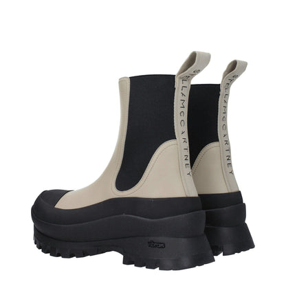 Stella McCartney Black Leather Ankle Boots in eco leather with taupe accents, mid heels, and back logo detail.