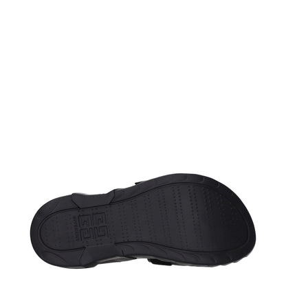 Sole view of Givenchy Black Fabric Slippers featuring rubber material and embossed logo.
