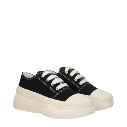 Stella McCartney Black Fabric Chunky Sneakers with rubber sole and lace-up closure featuring logo, round toe, and mid heels.