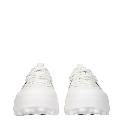 Jil Sander White Leather Sneakers with lace-up closure, side logo detail, and rubber sole, featuring round toe and mid heels.