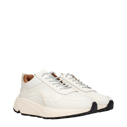 Buttero White Leather Low Top Sneakers with lace-up closure, rubber sole, mid heels, and round toe design.
