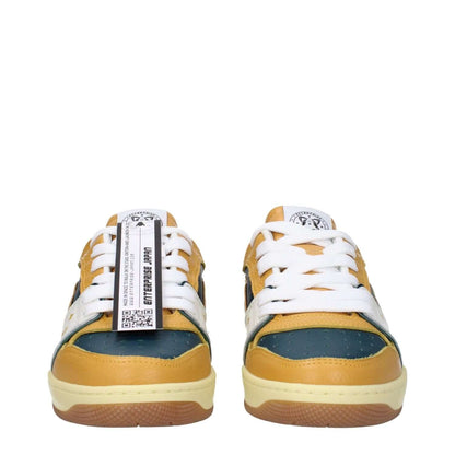 Enterprise Japan Green Leather Low Top Sneakers with mustard accents, round toe, lace-up closure, rubber sole, and logo detail.