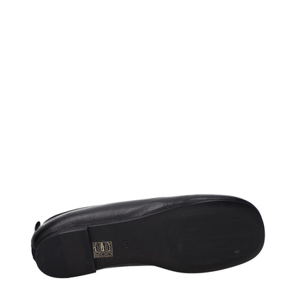 Premiata Black Leather Slip-On Loafers bottom view with leather sole and back logo, featuring round toe and low flat heel design.