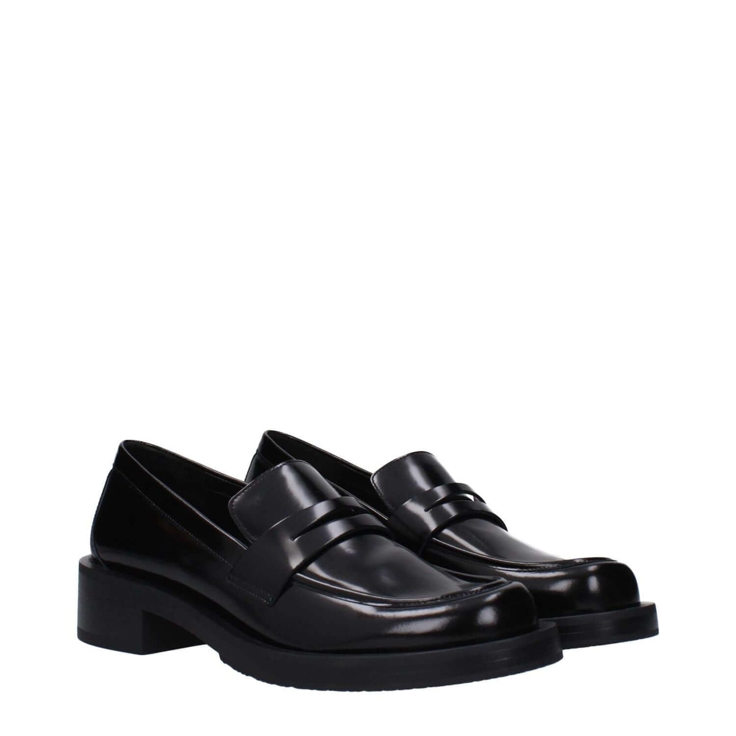 Stuart Weitzman Black Leather Slip-On Loafers with mid heels and round toe, made of leather and rubber sole.